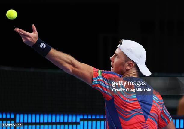 Illya Marchenko of Ukraine plays a shot against Alexander Bublik of Kazakhstan during on Day Two of the VTB Kremlin Cup on the Central Court of the...