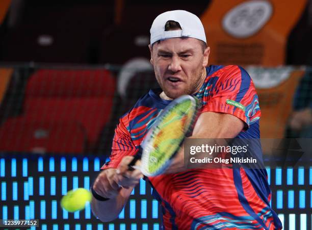 Illya Marchenko of Ukraine plays a shot against Alexander Bublik of Kazakhstan during on Day Two of the VTB Kremlin Cup on the Central Court of the...