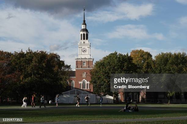 Students walk on The Green at Dartmouth College in Hanover, New Hampshire, U.S., on Sunday, Oct. 17, 2021. Dartmouth Colleges endowment returned 47%...
