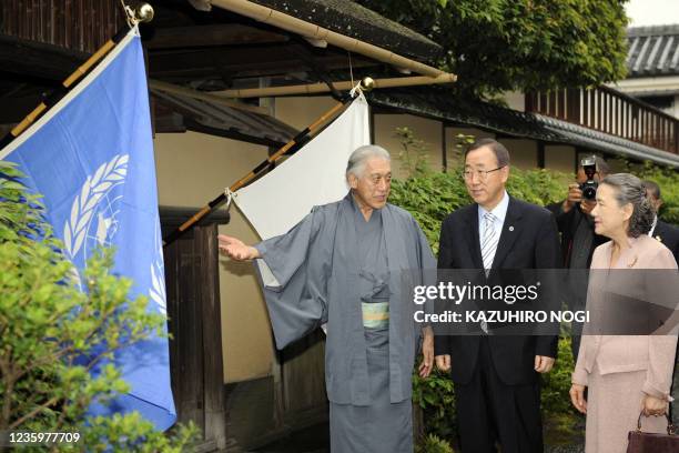 Secretary General Ban Ki-Moon and his wife Yoo Soon-taek are welcomed by Sen Genshitsu , former grand master of the Urasenke at the Urasenke home...