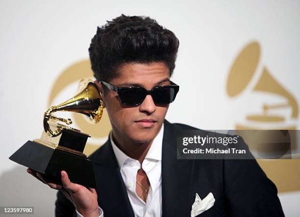 Singer Bruno Mars poses in the press room at The 53rd Annual GRAMMY Awards held at Staples Center on February 13, 2011 in Los Angeles, California.