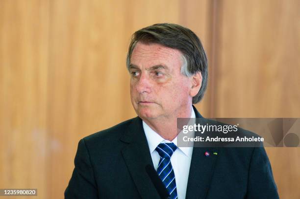 President of Brazil Jair Bolsonaro looks on during a press conference with the president of Colombia Ivan Duque as part of an official visit to...