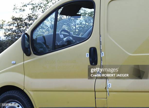 The van where two migrants were discovered dead inside during a control is pictured near the Austrian-Hungarian border near Siegendorf, Burgenland,...