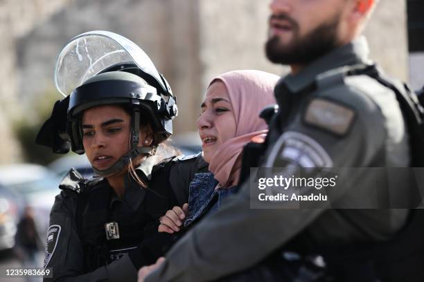 Israeli police arrest a Palestinian at Damascus Gate as Palestinian Muslims stage a march to mark the day of Mawlid al-Nabi in Old City, East...