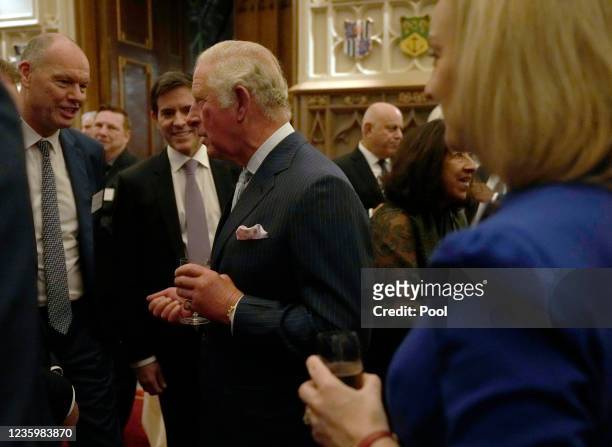 Prince Charles, Prince of Wales greets guests during a reception for international business and investment leaders at Windsor Castle to mark the...
