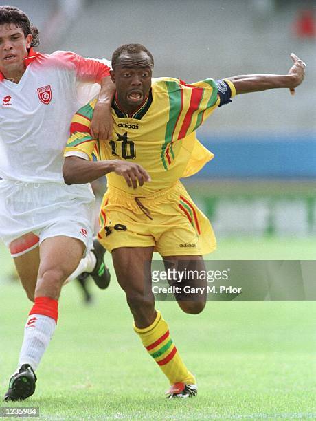 Ghana's Abedi Pele chases the ball during Ghana's 2-1 victory today at Port Elizabeth in the First round of the African Cup of Nations. Mandatory...