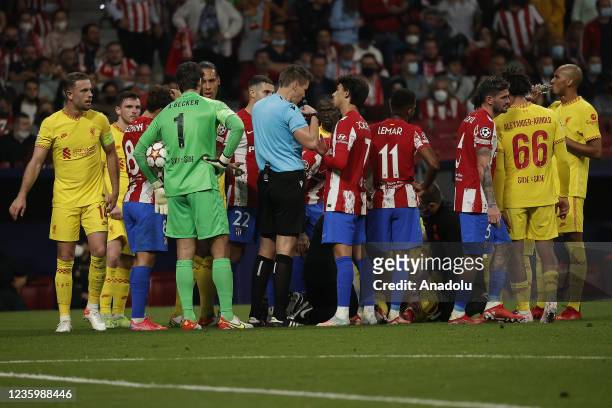 Players of both teams react during the UEFA Champions League Group B soccer match between Atletico Madrid and Liverpool at Wanda Metropolitano...
