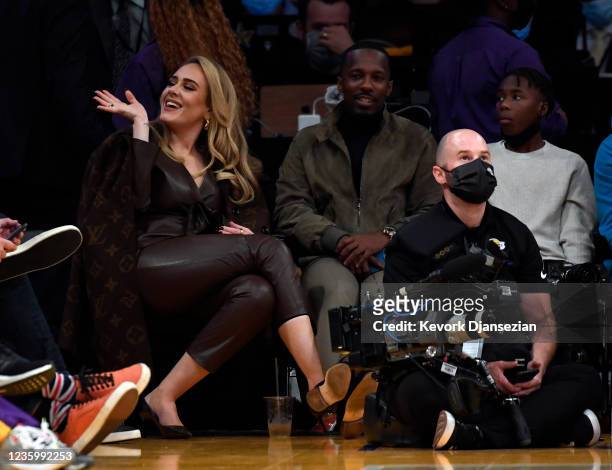 Singer Adele and Rich Paul attend a game between the Los Angeles Lakers and the Golden State Warriors at Staples Center on October 19, 2021 in Los...