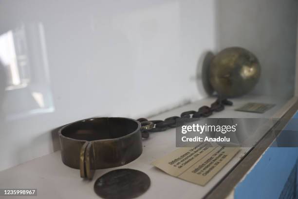 An iron handcuff with chain presented at The National Museum of Slavery is seen in Luanda, Angola on October 19, 2021. The museum in the Morro da...