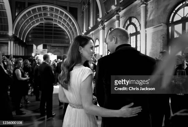 In this exclusive image released on October 20, 2021 - Prince William, Duke of Cambridge and Catherine, Duchess of Cambridge are seen together...