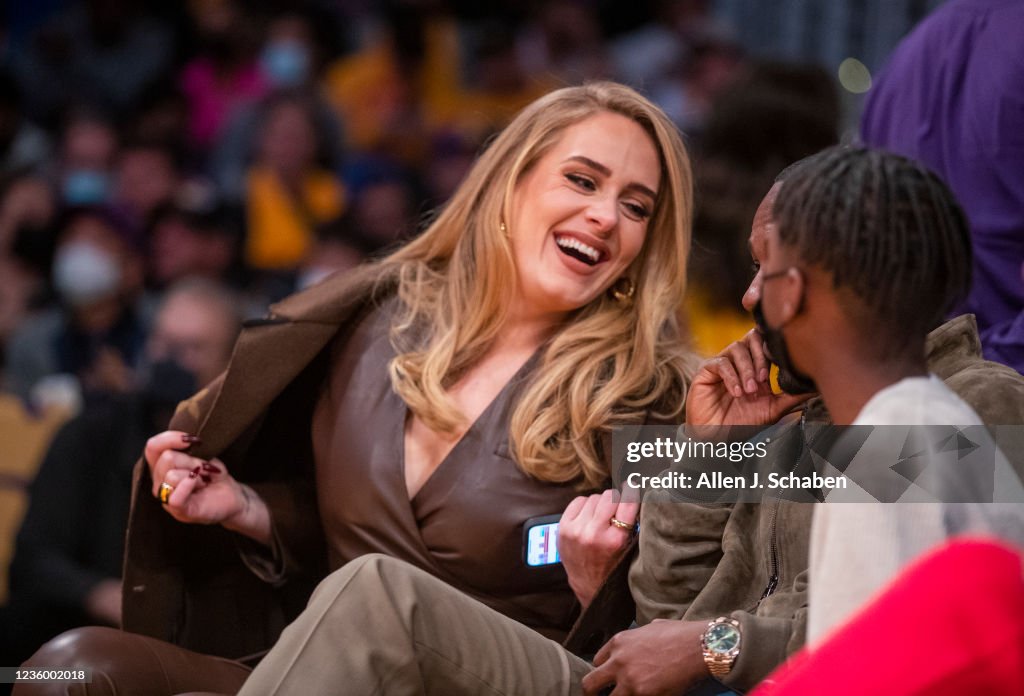 Celebrities attend the Los Angeles Lakers play the Golden State Warriors during the season opener