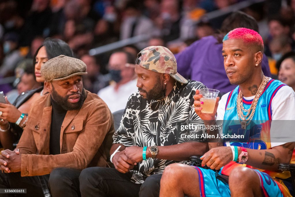 Celebrities attend the Los Angeles Lakers play the Golden State Warriors during the season opener