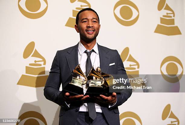 Singer John Legend poses in the press room at The 53rd Annual GRAMMY Awards held at Staples Center on February 13, 2011 in Los Angeles, California.