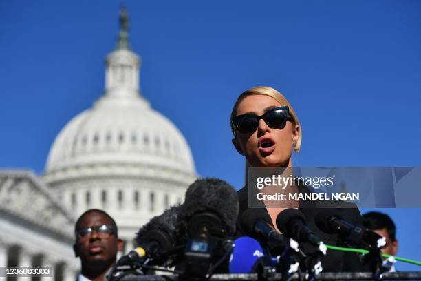 Paris Hilton speaks as she joins congressional lawmakers during a press conference on upcoming legislation to establish a bill of rights to protect...