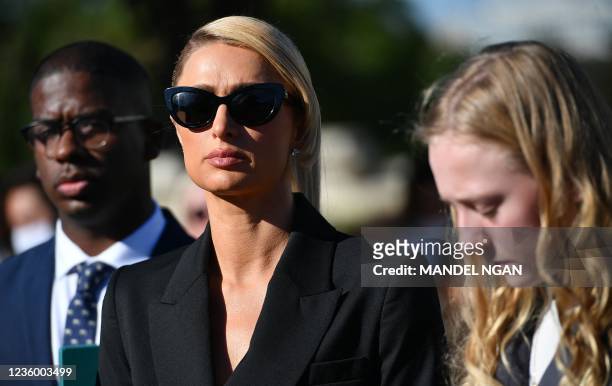 Paris Hilton joins congressional lawmakers during a press conference on upcoming legislation to establish a bill of rights to protect children placed...
