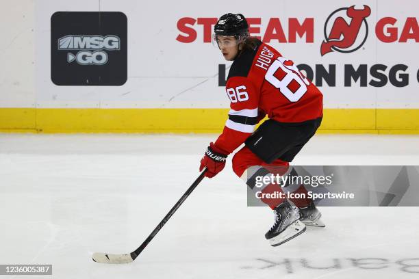 New Jersey Devils center Jack Hughes skates during the National Hockey League game between the New Jersey Devils and the Seattle Kraken on October...