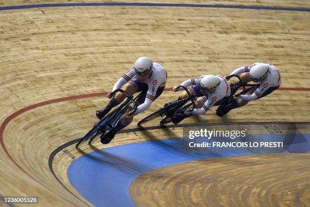 Great Britain team's members Lauren Bate, Blaine Ridge-Davis and Millicent Tanner compete in the women's Team Sprint qualifying during the UCI Track...