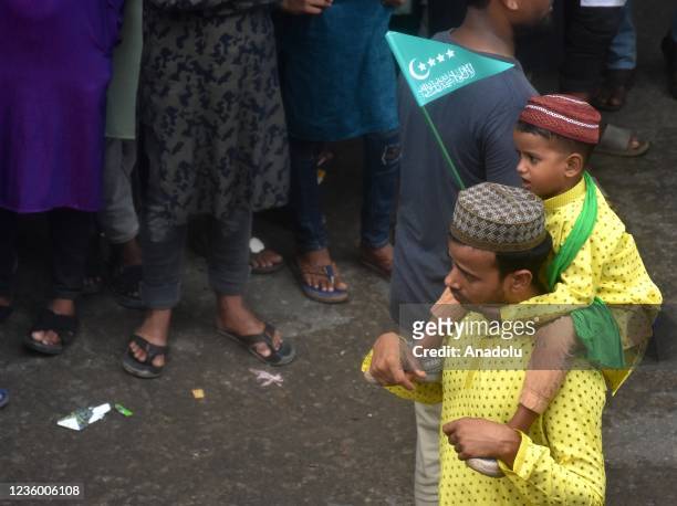 People take part in a procession on the occasion of Eid Milad-un-Nabi, birth anniversary of Muslims beloved Prophet Muhammad in Chittagong,...