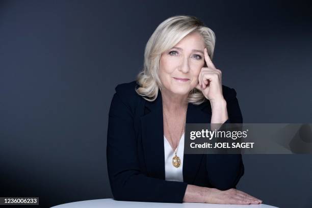 French far-right party Rassemblement National's presidential candidate Marine Le Pen poses during a photo session in Paris on October 20, 2021