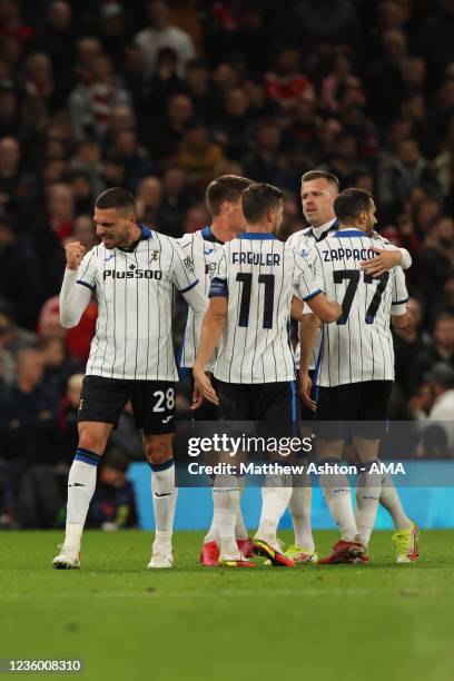 Merih Demiral of Atalanta celebrates after scoring a goal to make it 0-2 during the UEFA Champions League group F match between Manchester United and...