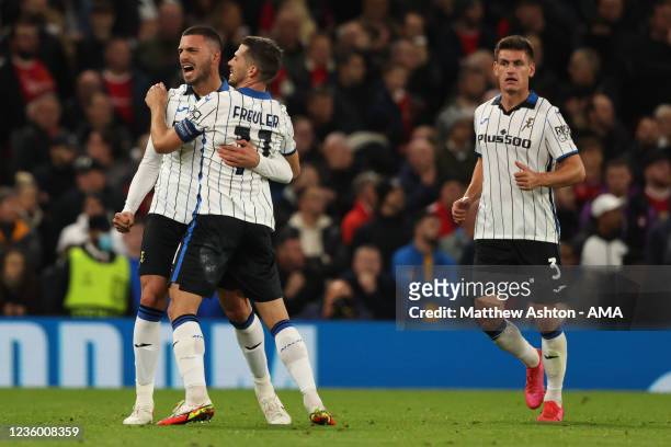 Merih Demiral of Atalanta celebrates after scoring a goal to make it 0-2 during the UEFA Champions League group F match between Manchester United and...