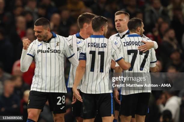 Merih Demiral of Atalanta celebrates after scoring a goal to make it 0-2 during the UEFA Champions League group F match between Manchester United and...