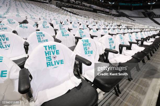 The Charlotte Hornets lay out shirts for fans before the game against the Indiana Pacers on October 20, 2021 at Spectrum Center in Charlotte, North...