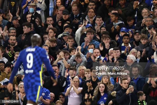Chelsea fan applaud as Romelu Lukaku leaves the game through injury during the UEFA Champions League group H match between Chelsea FC and Malmo FF at...