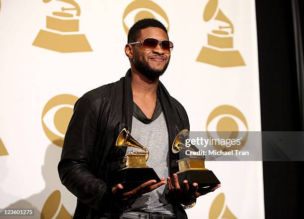 Singer Usher poses in the press room at The 53rd Annual GRAMMY Awards held at Staples Center on February 13, 2011 in Los Angeles, California.