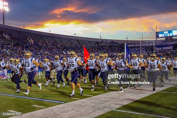 The Navy Midshipmen take the field prior to the game between the Memphis Tigers and the Navy Midshipmen on October 14 at Liberty Bowl Memorial...