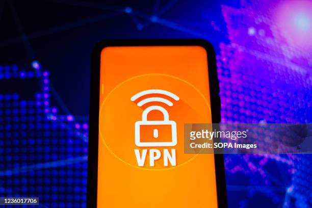 In this photo illustration, the Virtual Private Network is seen displayed on a smartphone. This type of connection establishes safe internet...