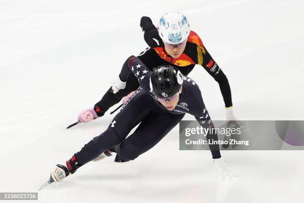 Kristen Santos of The United States and Han Yutong of China competes in the Women's 1500m Preliminaries during the day one of 2021/2022 ISU World Cup...