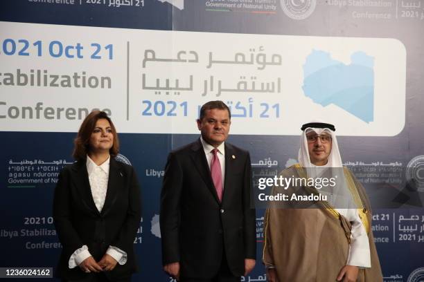 Libyan Prime Minister Abdulhamid Dbeibah , Kuwaiti Foreign Minister Sheikh Ahmad Nasser al-Mohammad al-Sabah and Libyan Foreign Minister Najla...