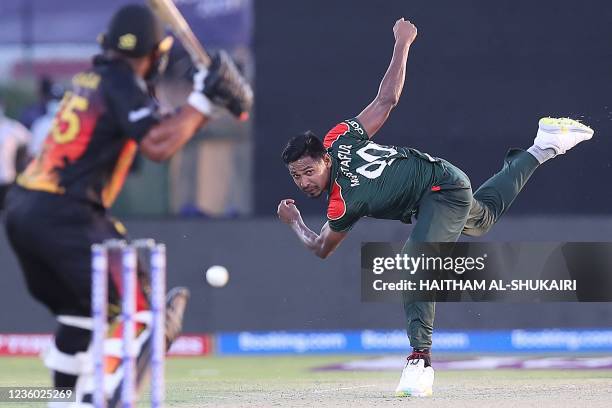 Bangladesh's Mustafizur Rahman delivers a ball during the ICC men's Twenty20 World Cup cricket match between Bangladesh and Papua New Guinea at the...