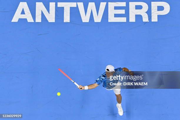 Argentina's Diego Schwartzman returns a ball to British Andy Murray in their 1/8 finals of the European Open Tennis ATP tournament, in Antwerp on...