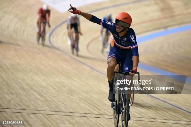 France's Donovan Grondin celebrates after winning the men's Scratch Race during the UCI Track Cycling World Championships at Jean-Stablinski...