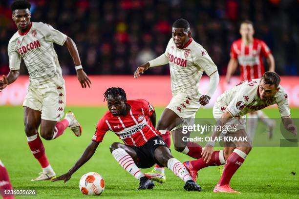 Eindhoven's Portuguese Bruma fights for the ball during the UEFA Europa League match between PSV Eindhoven and AS Monaco at Phillips Stadium in...