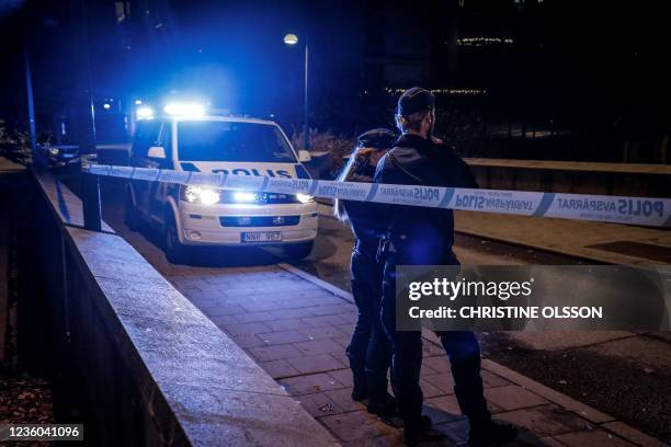 Police forensics work on the site where a person believed to be the Swedish rap artist Einar, officially named Nils Kurt Erik Einar Gronberg, was...