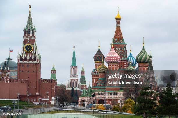 The Spasskaya tower of the Kremlin, left, and Saint Basil's Cathedral, right, in Moscow, Russia, on Thursday, Oct. 21, 2021. The Bank of Russia is...