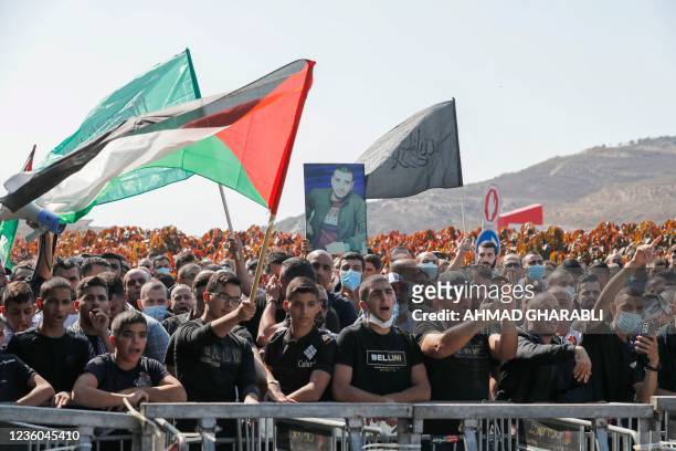 Arab Israelis rally for a demonstration in the mostly Arab city of Umm al-Fahm in northern Israel, to denounce crime and violence they say target...