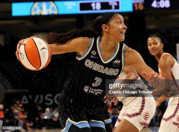 The Chicago Sky&apos;s Candace Parker drives to the basket in the first period against the Connecticut Sun on Wednesday, Oct. 6 at Wintrust Arena in...