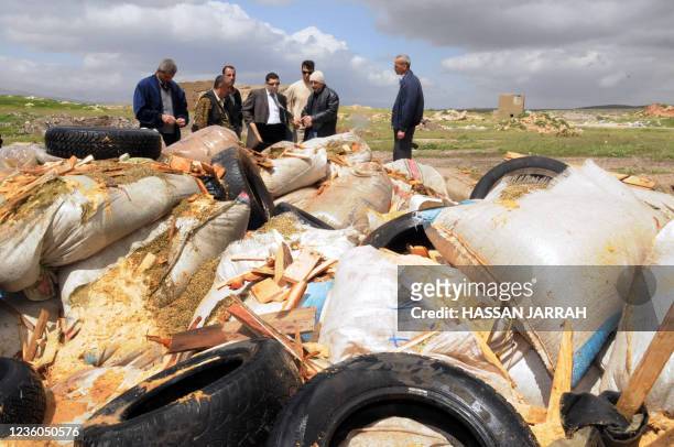 Lebanese security officials prepare to burn loads of cannabis confiscated during raids conducted by the Lebanese Army to hunt down drug lords in the...