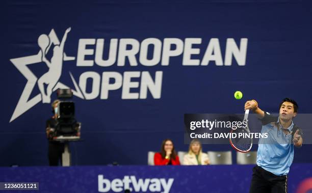 Brandon Nakashima returns the ball to Argentina's Diego Schwartzman in their European Open Tennis ATP tournament 1/4 finals in Antwerp, on October...