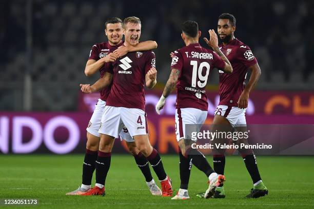 Tommaso Pobega of Torino FC celebrates a goal with team mate Antonio Sanabria during the Serie A match between Torino FC and Genoa CFC at Stadio...