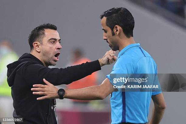 Sadd's coach Xavi reacts during the Amir Cup final football match between Al-Sadd and Al-Rayyan at the Al-Thumama Stadium in the capital Doha on...