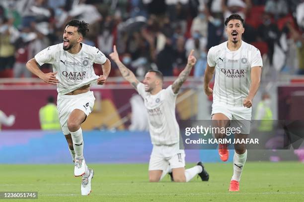 Sadd's players celebrate after winning the Amir Cup final football match between Al-Sadd and Al-Rayyan at the Al-Thumama Stadium in the capital Doha...