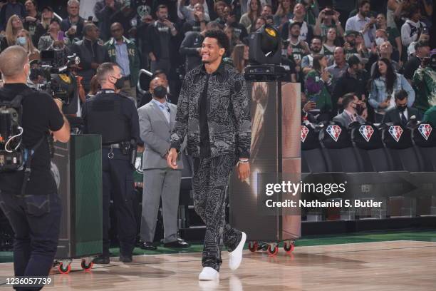 Axel Toupane of the Milwaukee Bucks receives the 2021 NBA Championship ring before the game against the Brooklyn Nets on October 19, 2021 at the...