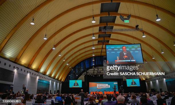 North Rhine-Westphalia's State Premier Armin Laschet delivers a speech at the state party conference of North- Rhine Westphalia's Christian...