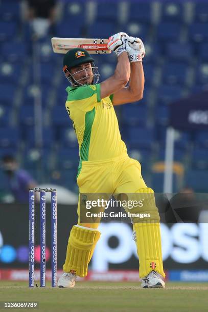 Marcus Stoinis of australia playing a shot during the 2021 ICC T20 World Cup match between Australia and South Africa at Sheikh Zayed Stadium on...