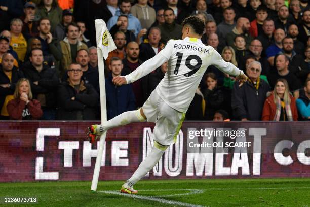 Leeds United's Brazilian-born Spanish striker Rodrigo celebrates scoring their first goal from the penalty spot to equalise 1-1 during the English...